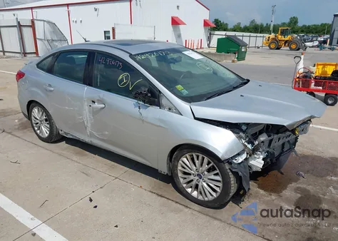 2017 Ford Focus Titanium from USA, damaged, VIN 1FADP3J21HL239524